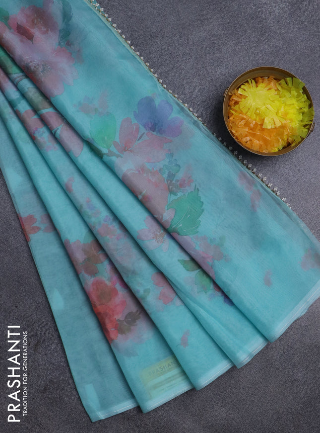 Semi organza saree teal blue with floral butta prints in borderless style