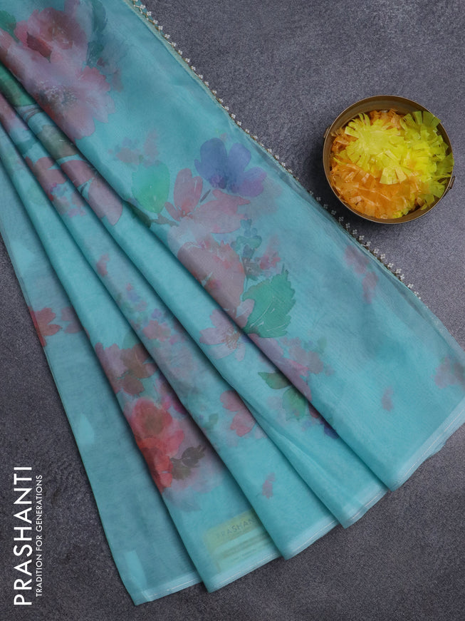 Semi organza saree teal blue with floral butta prints in borderless style