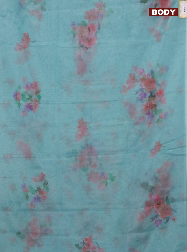 Semi organza saree teal blue with floral butta prints in borderless style