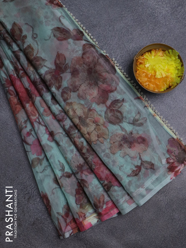 Semi organza saree pastel green with allover floral prints in borderless style