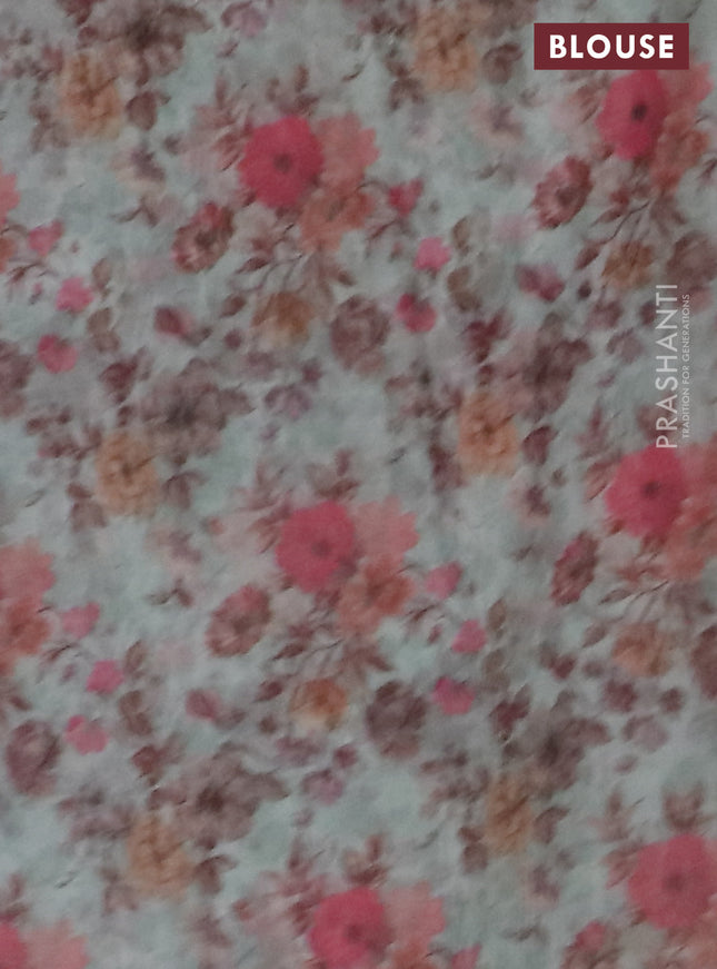 Semi organza saree pastel green with allover floral prints in borderless style