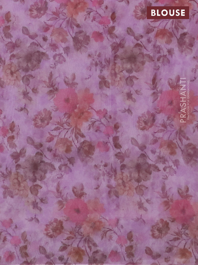 Semi organza saree lavender shade with allover floral prints in borderless style