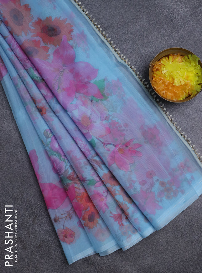 Semi organza saree light blue with floral butta prints in borderless style