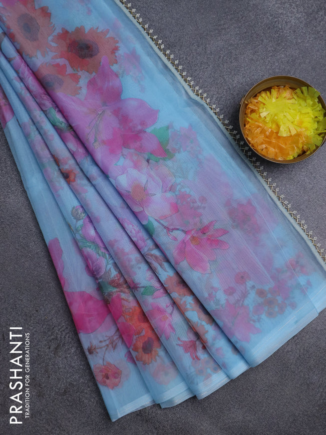Semi organza saree light blue with floral butta prints in borderless style