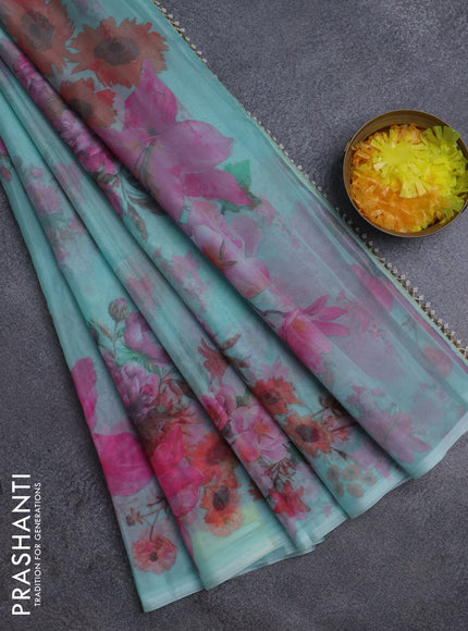 Semi organza saree teal blue with floral butta prints in borderless style