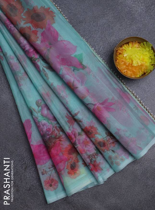 Semi organza saree teal blue with floral butta prints in borderless style