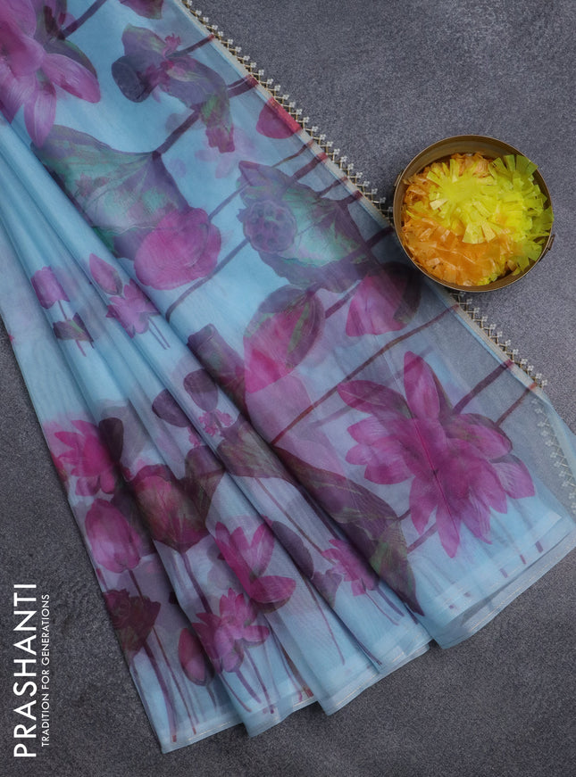 Semi organza saree pastel blue with floral butta prints and long floral printed border