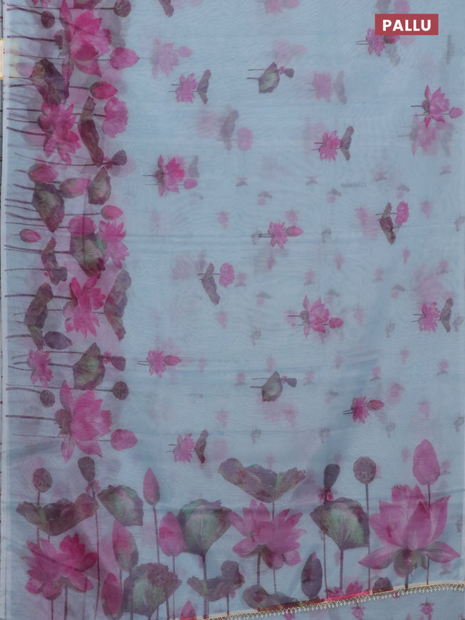 Semi organza saree pastel blue with floral butta prints and long floral printed border