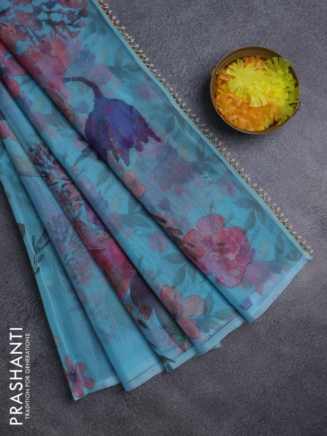 Semi organza saree teal blue with floral prints in borderless style