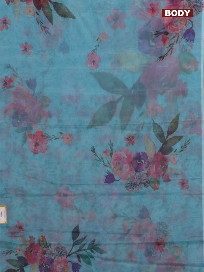 Semi organza saree teal blue with floral prints in borderless style