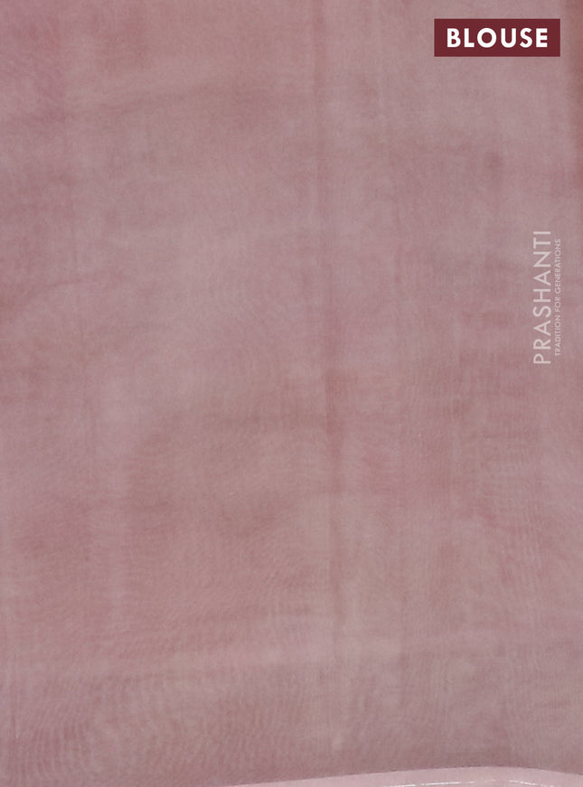 Semi organza saree pastel peach with allover floral prints in borderless style