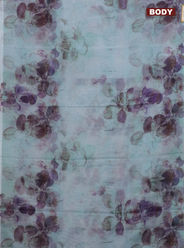 Semi organza saree light blue with allover floral prints in borderless style