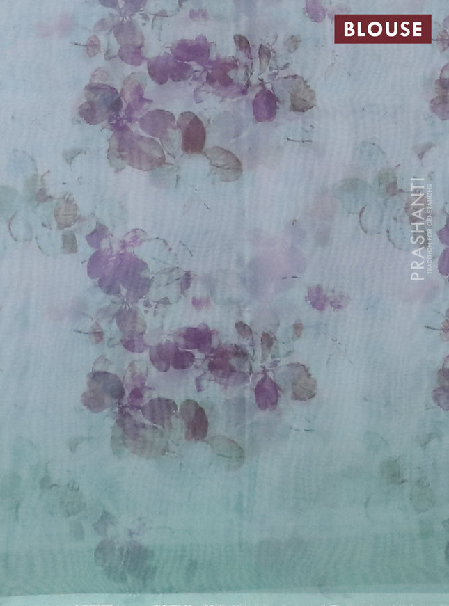 Semi organza saree light blue with allover floral prints in borderless style