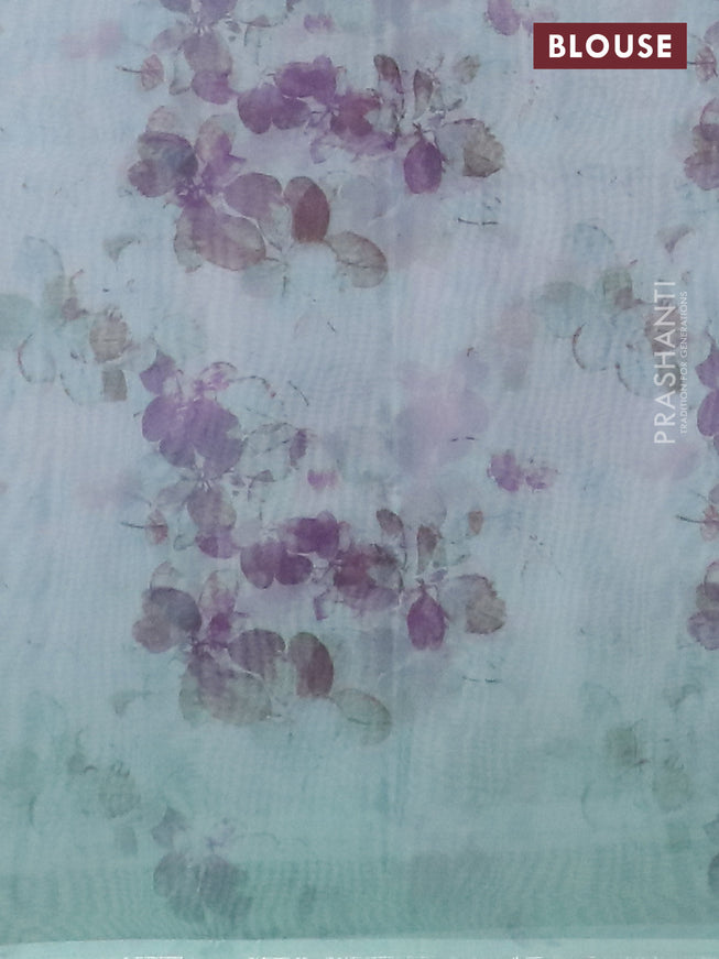 Semi organza saree light blue with allover floral prints in borderless style