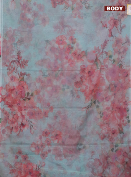 Semi organza saree teal blue with allover floral prints in borderless style