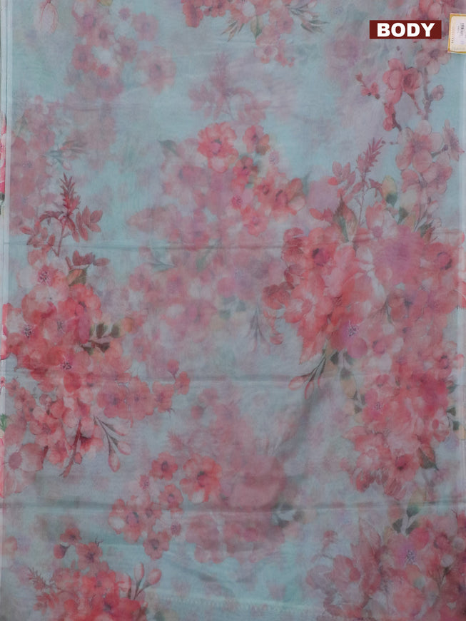 Semi organza saree teal blue with allover floral prints in borderless style