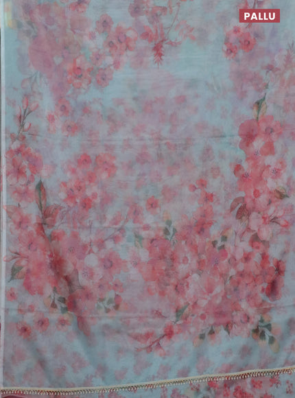 Semi organza saree teal blue with allover floral prints in borderless style