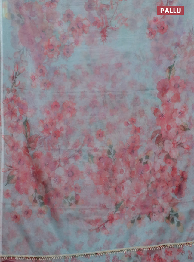 Semi organza saree teal blue with allover floral prints in borderless style