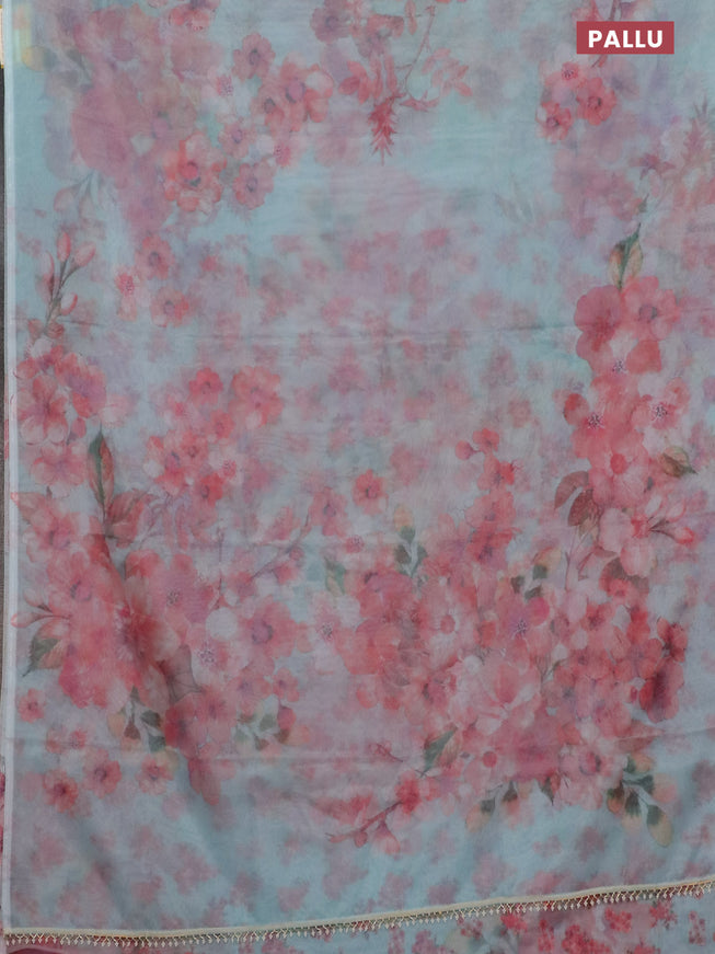 Semi organza saree teal blue with allover floral prints in borderless style