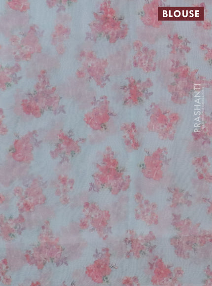 Semi organza saree teal blue with allover floral prints in borderless style