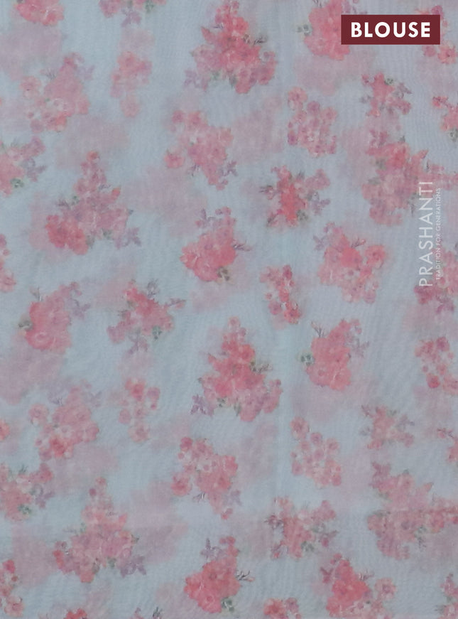 Semi organza saree teal blue with allover floral prints in borderless style