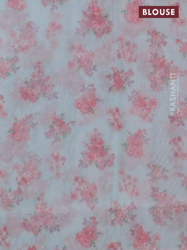 Semi organza saree teal blue with allover floral prints in borderless style