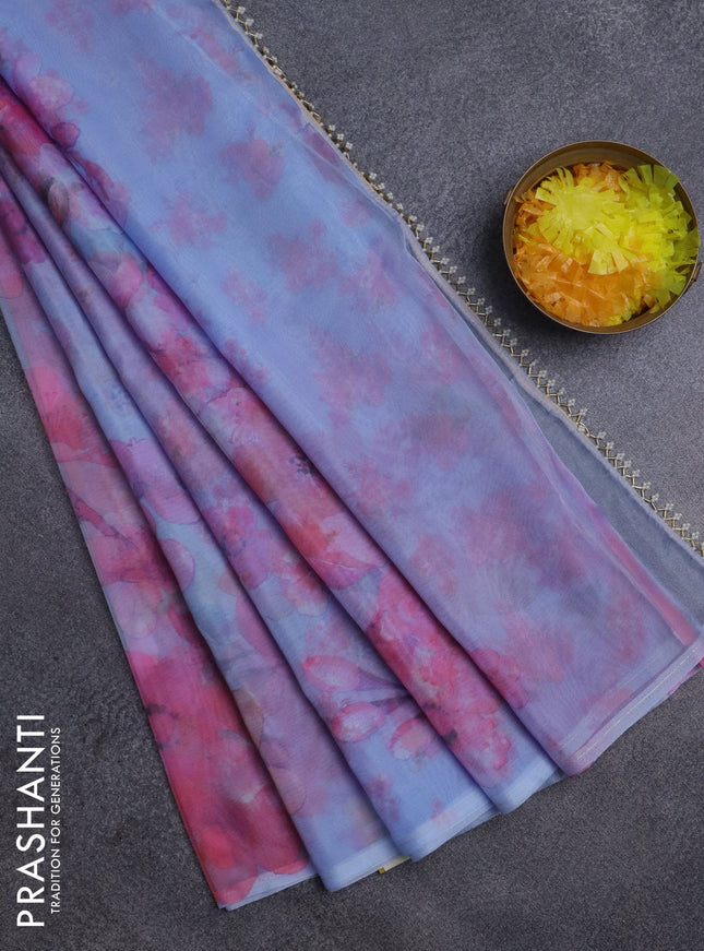 Semi organza saree lavender shade with allover floral prints in borderless style