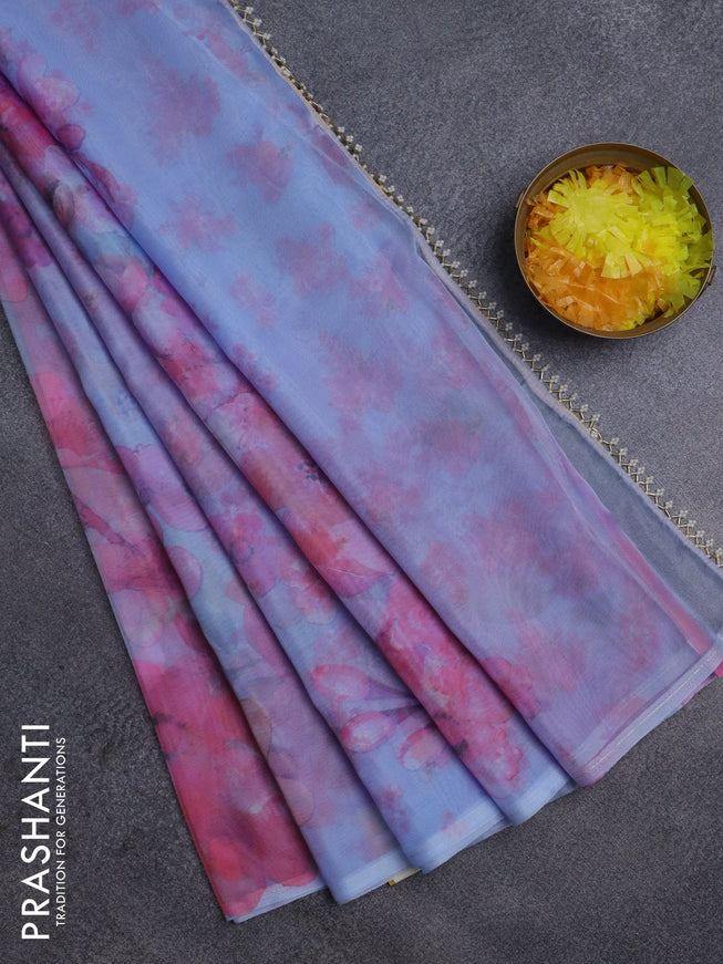 Semi organza saree lavender shade with allover floral prints in borderless style