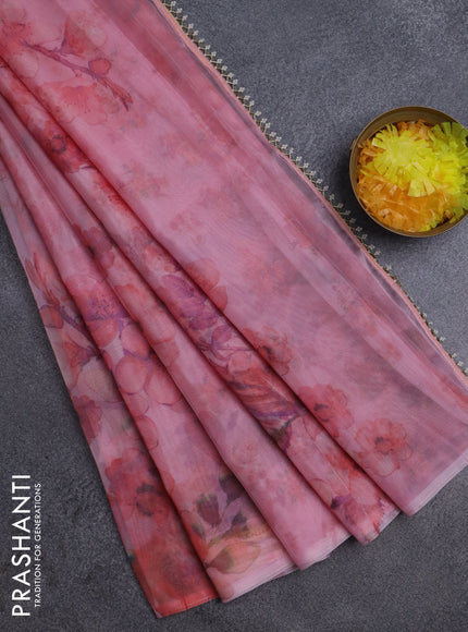 Semi organza saree peach pink with allover floral prints in borderless style