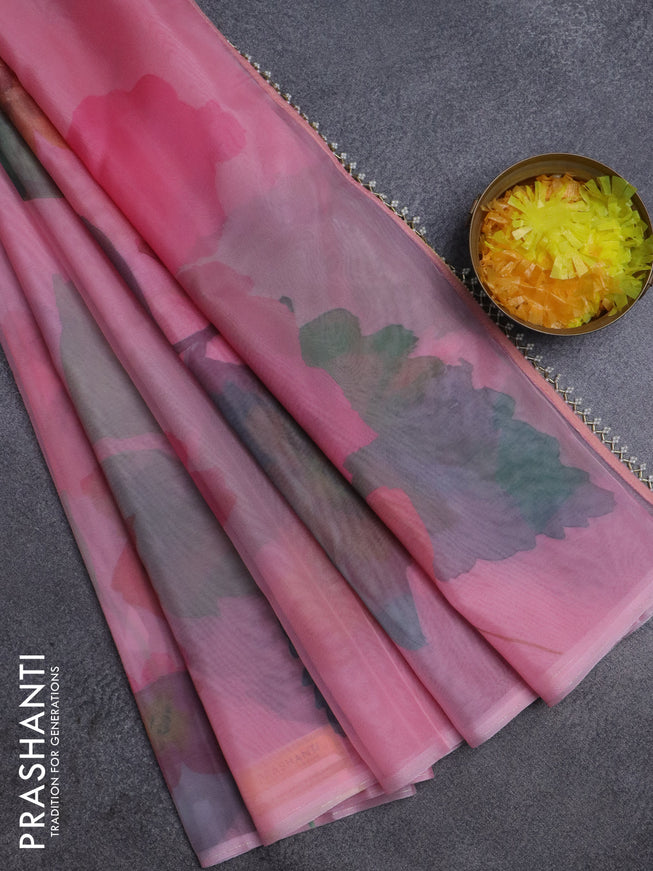 Semi organza saree peach pink with allover floral prints in borderless style