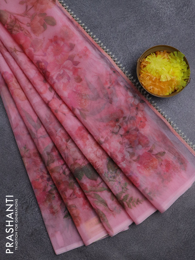 Semi organza saree peach pink with allover floral prints in borderless style