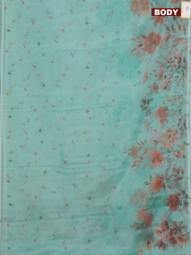 Semi organza saree teal green shade with allover floral prints in borderless style