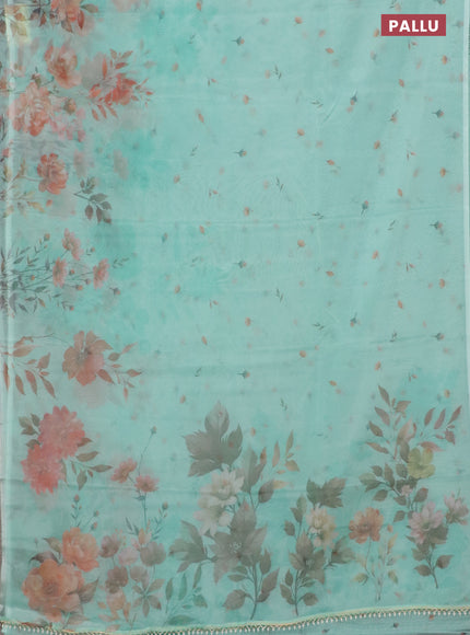 Semi organza saree teal green shade with allover floral prints in borderless style