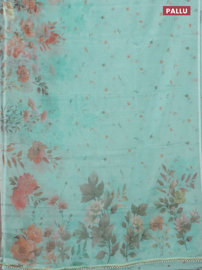 Semi organza saree teal green shade with allover floral prints in borderless style
