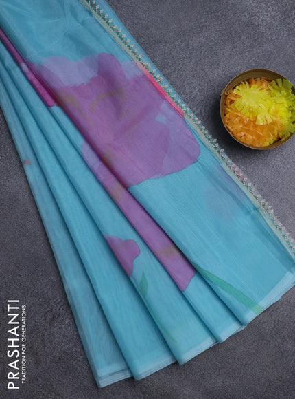 Semi organza saree light blue with floral butta prints in borderless style
