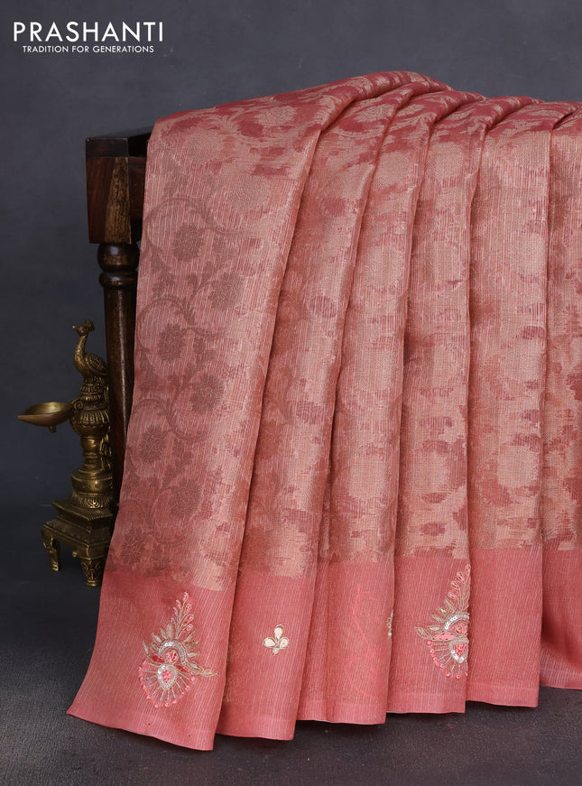 Kota tissue saree dark peach with floral prints & pita work and zardosi work butta border