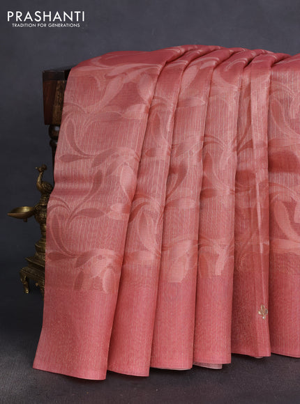 Kota tissue saree dark peach with floral prints & pita work and zardosi work butta border