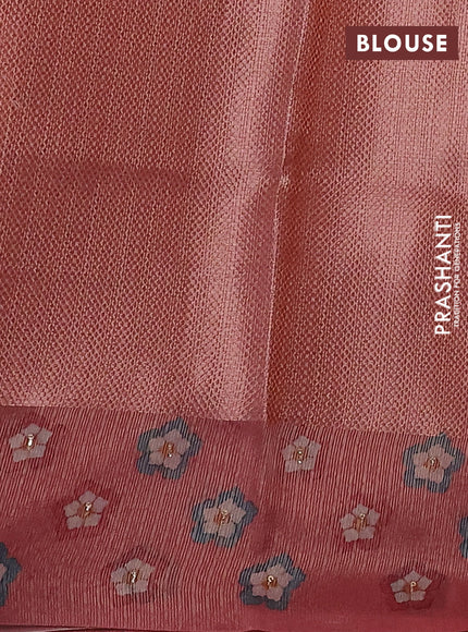 Kota tissue saree dark peach with floral prints & pita work and zardosi work butta border