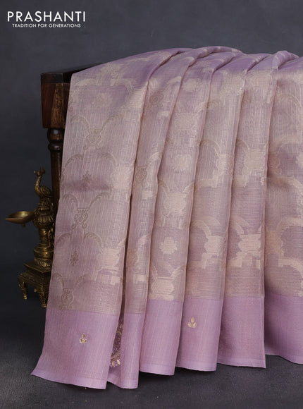 Kota tissue saree pastel lavender with floral prints & pita work and zardosi work butta border