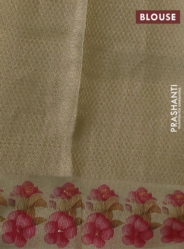 Kota tissue saree pista green with floral prints & pita work and zardosi work butta border