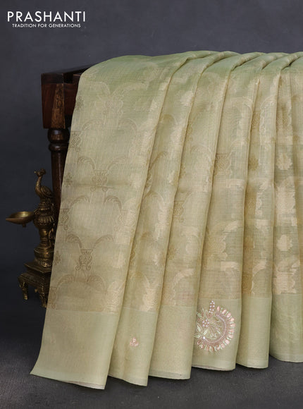 Kota tissue saree pista green with floral prints & pita work and zardosi work butta border