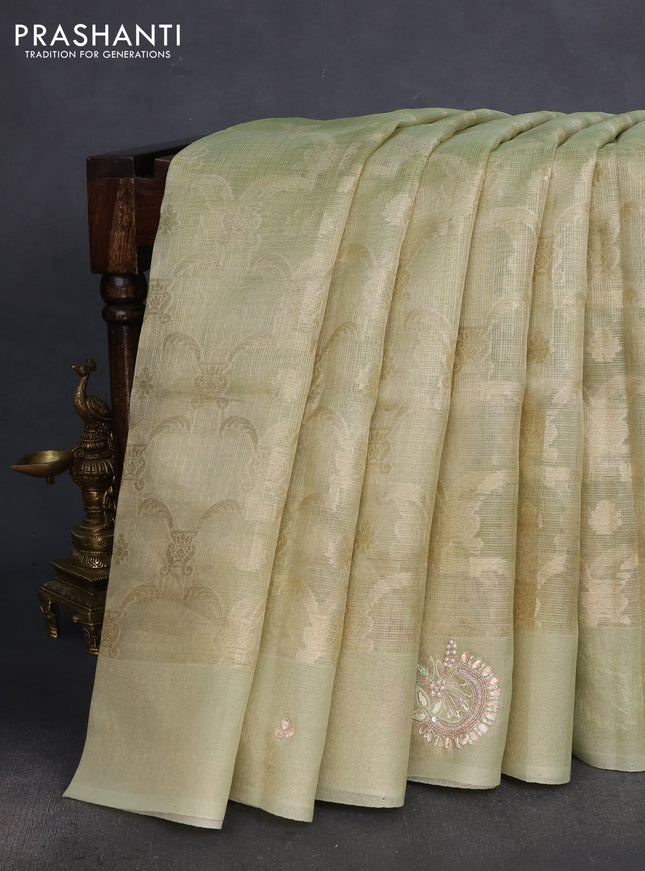 Kota tissue saree pista green with floral prints & pita work and zardosi work butta border