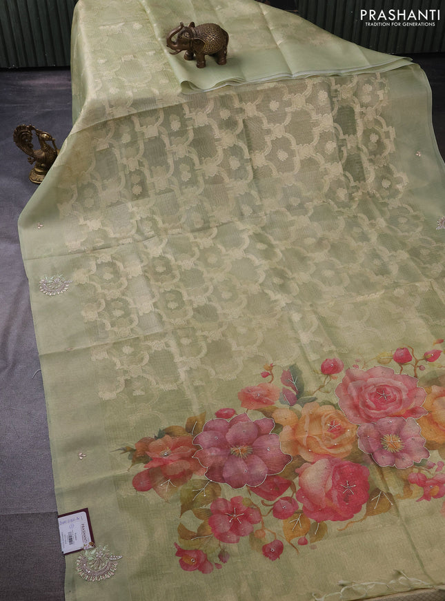 Kota tissue saree pista green with floral prints & pita work and zardosi work butta border