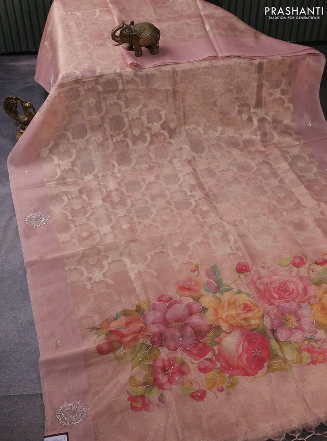 Kota tissue saree pastel peach with floral prints & pita work and zardosi work butta border