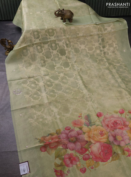 Kota tissue saree pista green with floral prints & pita work and zardosi work butta border