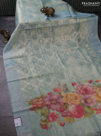 Kota tissue saree pastel blue with floral prints & pita work and zardosi work butta border