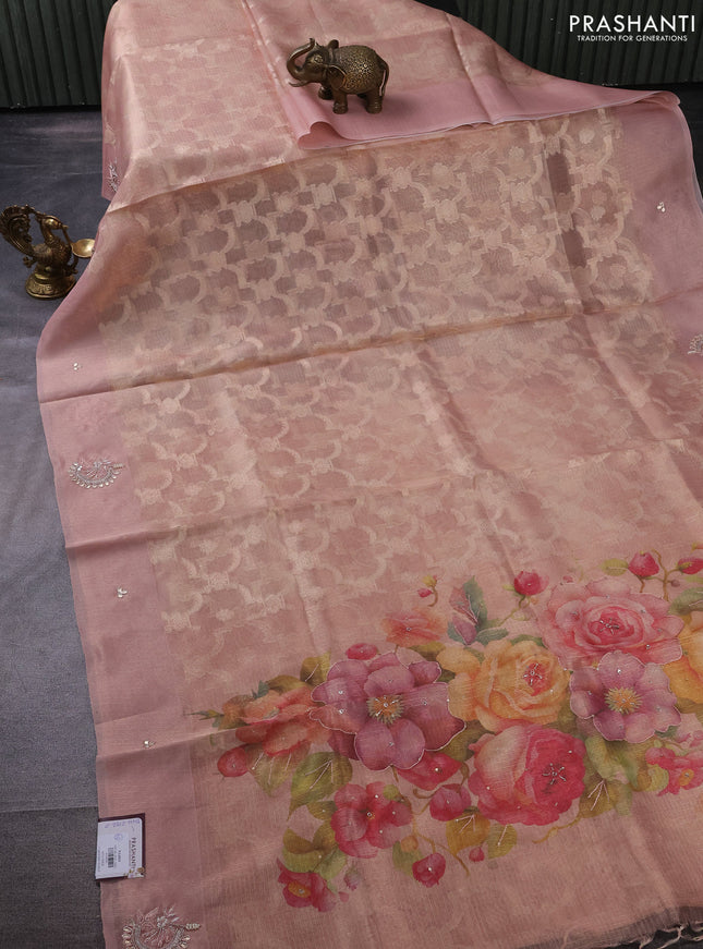 Kota tissue saree pastel peach with floral prints & pita work and zardosi work butta border