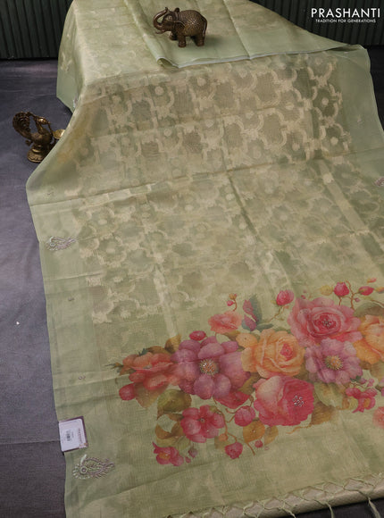 Kota tissue saree pista green with floral prints & pita work and zardosi work butta border