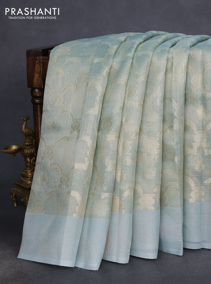 Kota tissue saree pastel blue with floral prints & pita work and zardosi work butta border