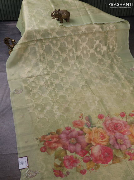 Kota tissue saree pista green with floral prints & pita work and zardosi work butta border